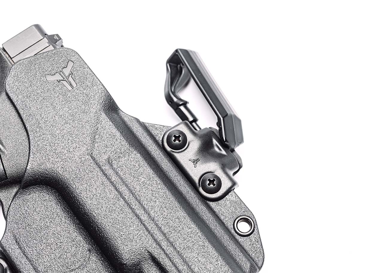 Close up of FBI Cant Mod inserted into Mod-Lok attachment on Total Eclipse 2.0 Gun Holster for Canted Outside the Waistband Carry