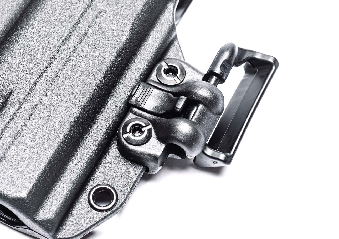 OWB Mod being inserted into Mod-Lok for Total Eclipse 2.0 Modular Holster with Quick Release Tab for easy removal and Inside the Waistband and Outside the Waistband Carry