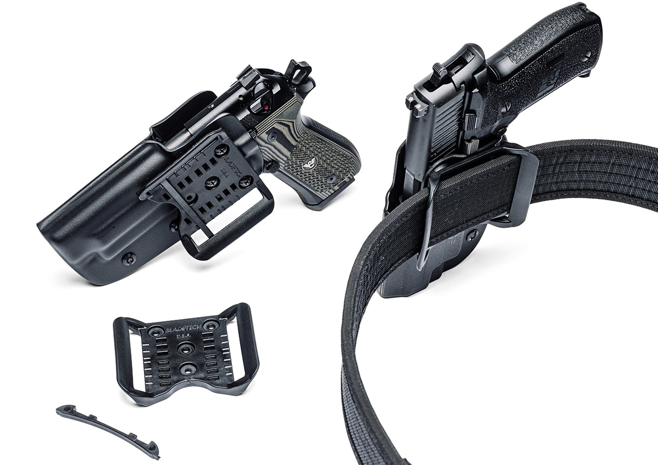 Classic Outside the Waistband (OWB) Holster with Adjustable Stingray Loop (ASR) Belt Attachment with Adjustable Belt Shim mounted onto Duty Gun Belt