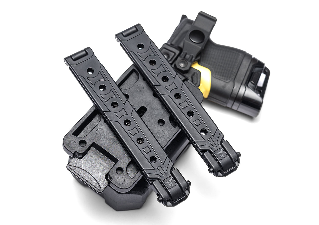 Molle-Lok mounted onto TMMS (Tactical Modular Mount System) with TASER Outside the Waistband (OWB) Holster