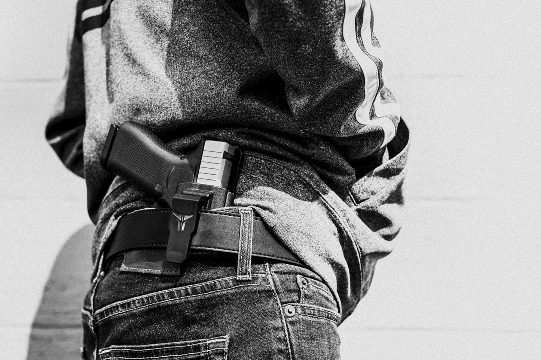 Person wearing Inside the Waistband (IWB) Klipt Holster with Ultimate Carry Belt