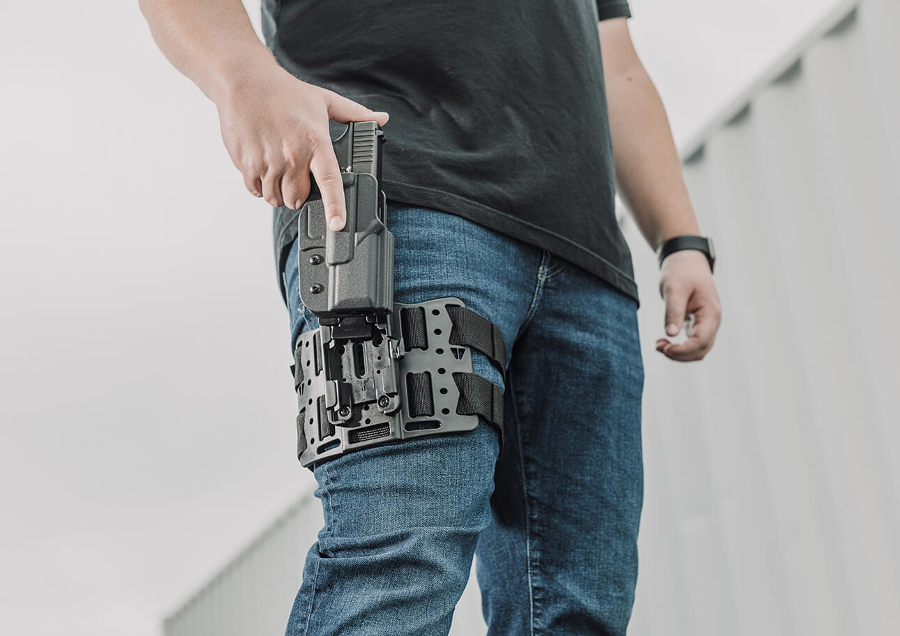 Holster attachments and clips for belts, molle and tactical vests and gear.